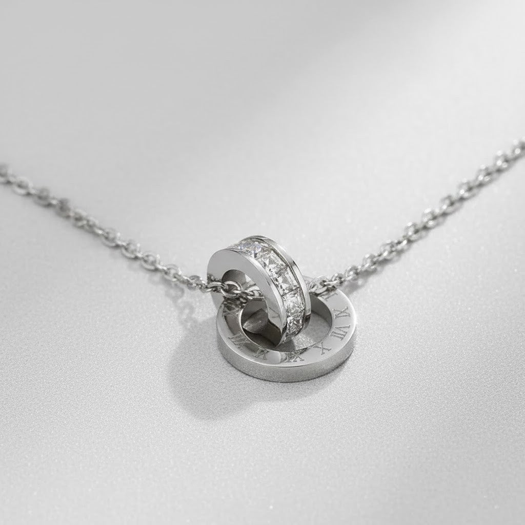 Collier Double Anneaux Entrelacés en Acier au Titane